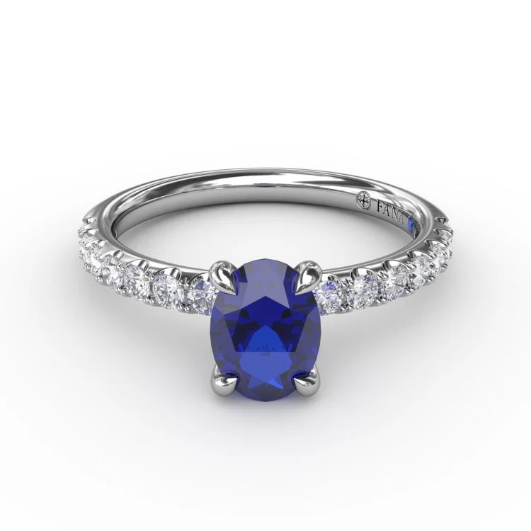 Striking Solitaire Sapphire And Diamond Ring